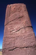 Views of a second representation of a face at Tiahuanaco showing exuberant mustachios or beard (There is a monochrome image in Fingerprints.)